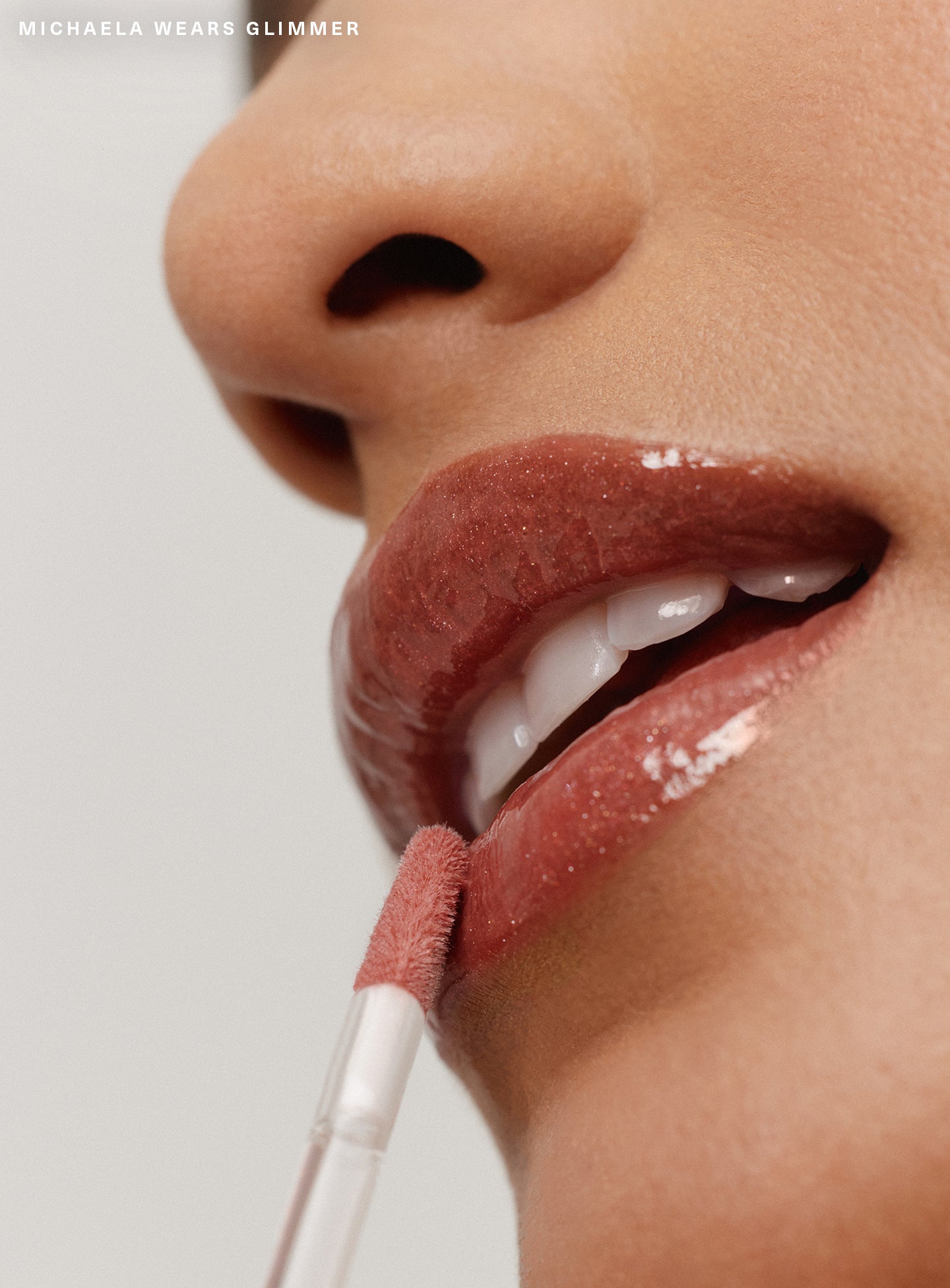 Positive Light Luminizing Lip Gloss by Rare Beauty