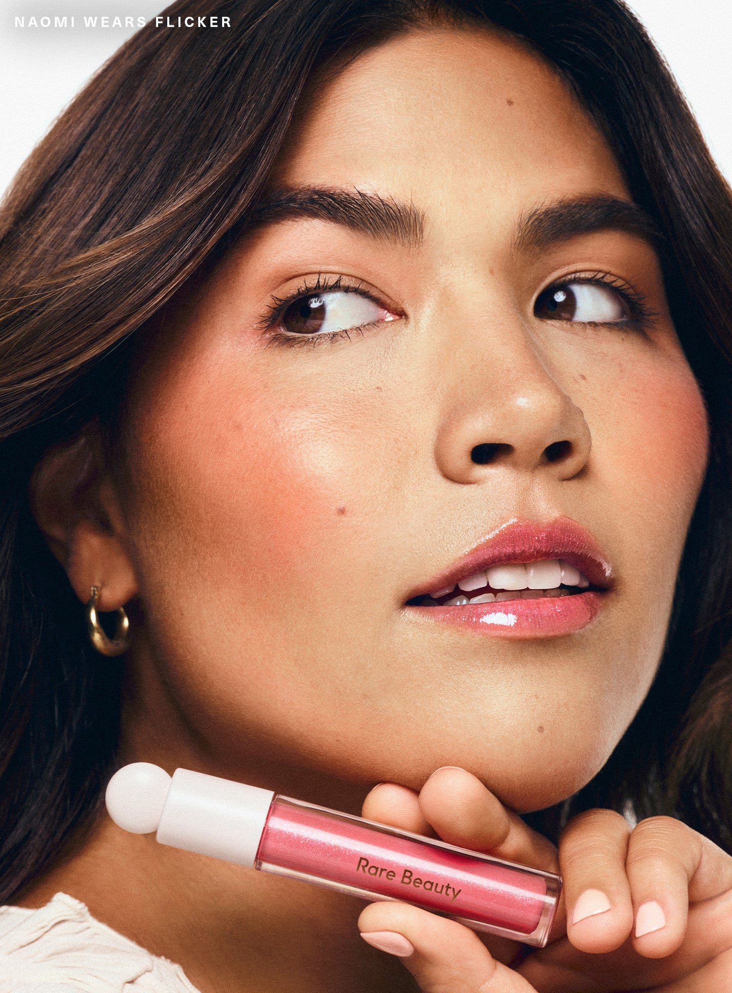 Positive Light Luminizing Lip Gloss by Rare Beauty