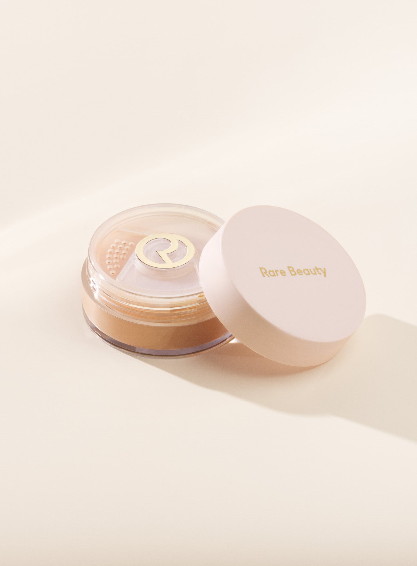 Always An Optimist Soft Radiance Setting Powder by Rare Beauty